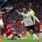 image of mo salah celebrating a goal for liverpool at old trafford versus manchester united